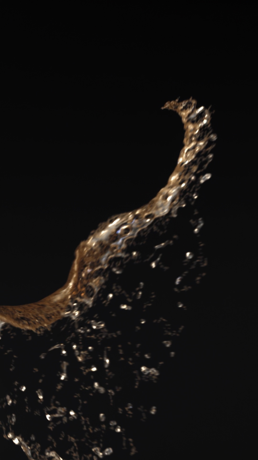 Golden liquid sweeping as a wave through dark space, surrounded by fine droplets